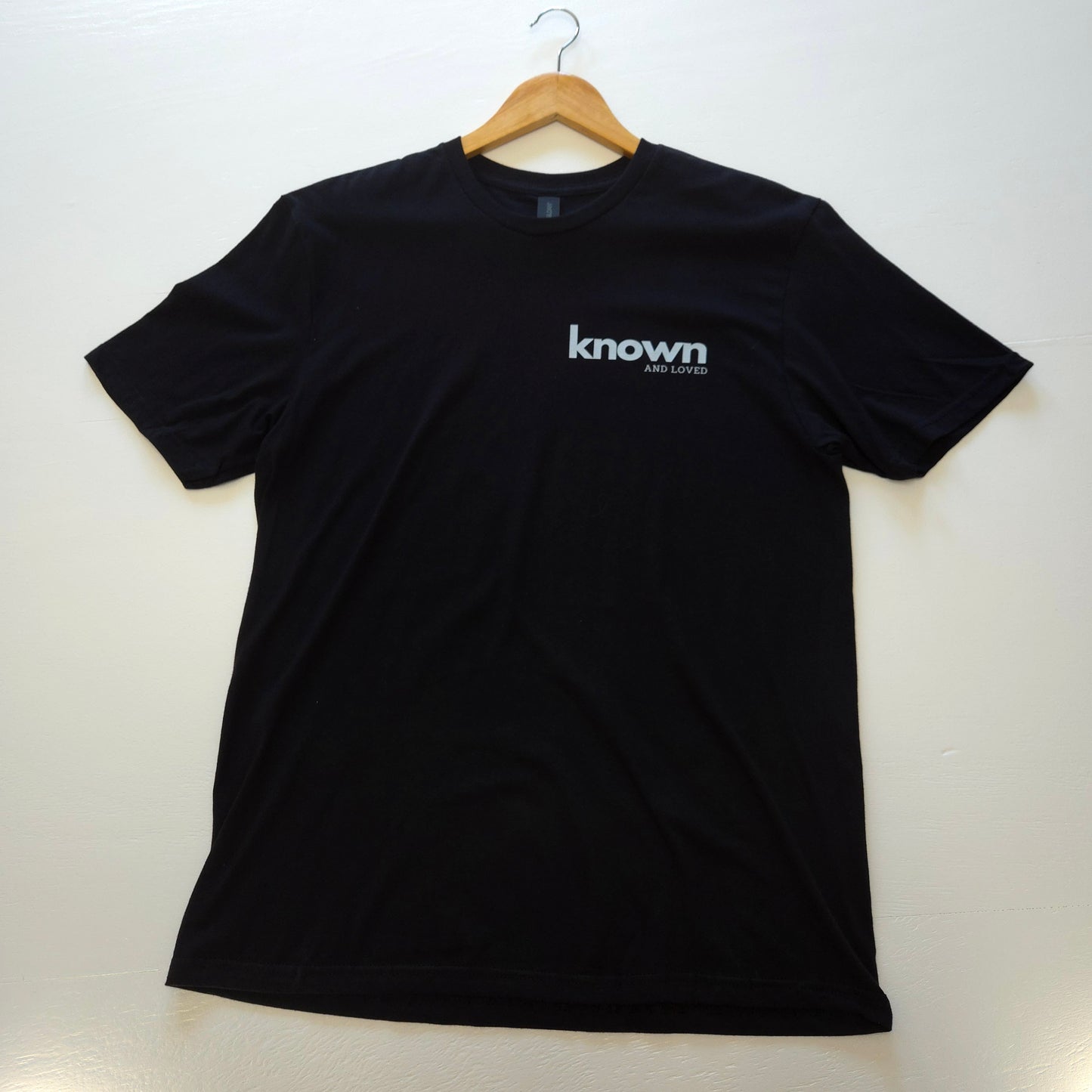 Known tee